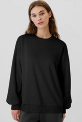 Black solid sweatshirt with dropped shoulders and fleece lining