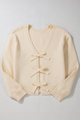 Jet stream cardigan ample knitted with butterfly knot on the front and v -neck