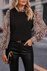 Blouse noire à manches contrasté-A WOMAN WE LOVE