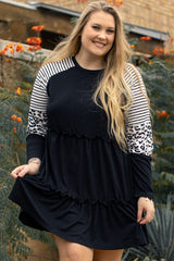Striped black dress with ruffles and large leopard patch patch sleeves