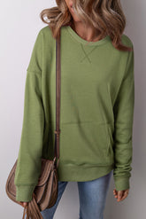 Ample sweatshirt with pockets and crossed seams *