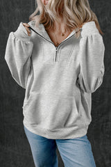 Light gray zipped sweatshirt with high collar and kangaroo pocket