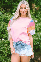 Pink top with puffy sleeves and color block stripes in Sequins