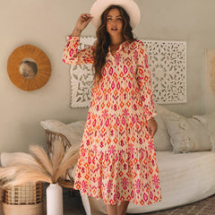 Vestido largo naranja con estampado geométrico abstracto Western