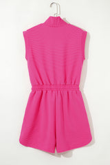 Combinaison à tissu texturé fuishia *
