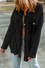 Black relaxed jacket with contrasting flap pockets