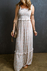 Long floral dress gathered with straps and white lace ruffles