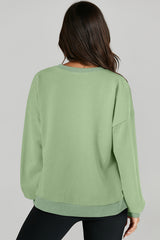 High-low drop-shoulder sweatshirt with solid fleece lining in grass green