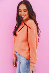 Sweatshirt with pearl sleeves and drooping shoulders, round neck