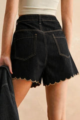 Short en jean noir à bordure festonnée et broderies
