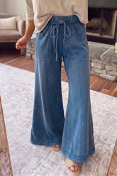 Pantalon évasé en coton délavé à cordon et coutures apparentes