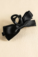 Large hair clip with black knot decor