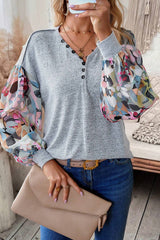 Gray floral top with lantern sleeves, buttoned patchwork, V-neck
