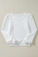 Sudadera blanca unida con mangas hinchadas y cuello redondo