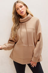 Sweat-shirt beige clair à col roulé et manches dolman avec cordon de serrage