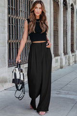 Pantalones elegantes plisados negros