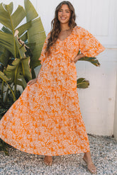 Vestido largo con estampado floral naranja*