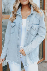Sky blue denim jacket with flap pocket and buttoned raw hem