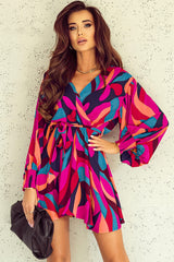 Belted mini dress with puff sleeves and bright red abstract print