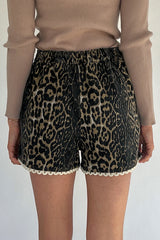 Short en jean léopard kaki à bordure en dentelle festonnée contrastée