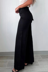 Jean large noir taille haute à 2 boutons