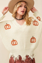 Beige cable knit loose sweater with raw hem and V-neck