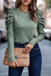 Green buttoned sheath top with long puff sleeves