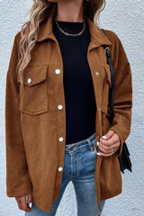 Textured brown jacket with flap pockets and drooping shoulders