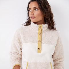Beige fleece button-down sweatshirt with pocket and color block trim