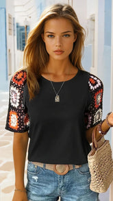 Black high with short sleeves in crochet *