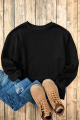 Sudadera negra en tela de esponja con hombro caído forrado con un lana de United