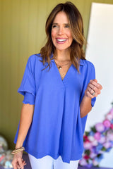 Chemisier bleu foncé à col carré et manches smockées aux poignets-A WOMAN WE LOVE