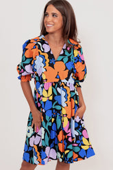 Robe évasée florale bleue à col fendu et à col fendu