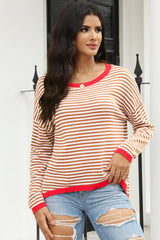 Brown sweater with dropped shoulders and stripes with contrasting edges