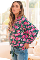 Blusa verde con mangas hinchadas y collar atado con estampado floral *