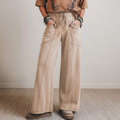 Pantalon large en coton délavé à taille haute, cordon et poches plaquées