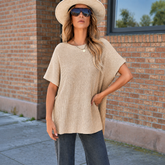 Pull oversize beige à manches courtes et fentes latérales