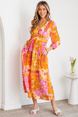 Robe longue orange à patchwork floral et dos ajouré à nouer