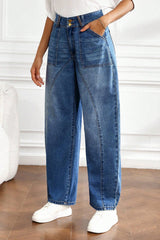 Jean baril bleu à taille haute, coutures courbes et revers