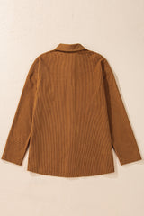 Textured brown jacket with flap pockets and drooping shoulders