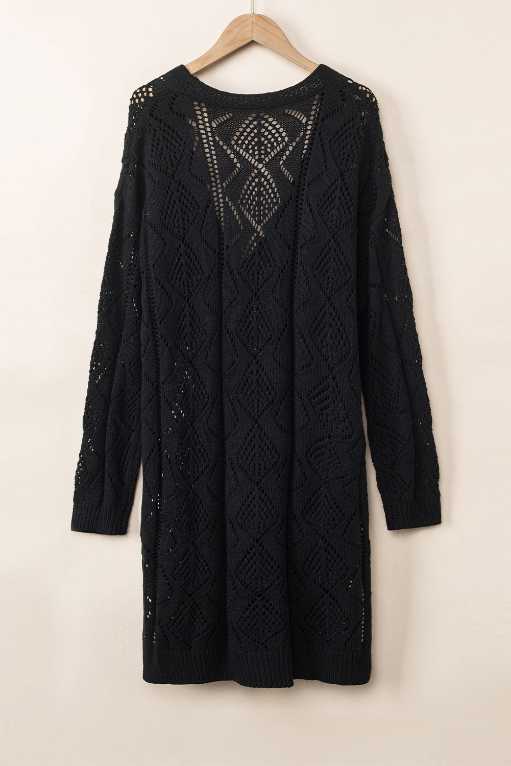 Cardigan en maille ajourée noir-A WOMAN WE LOVE