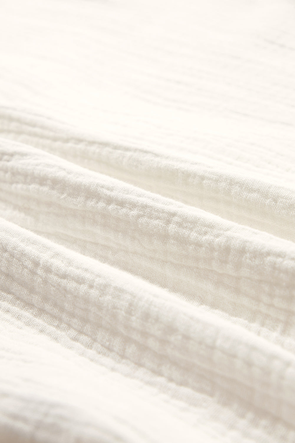 Chemise à col rond boutonnée texturée *-A WOMAN WE LOVE