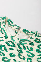 Haut à manches bouffantes et col montant imprimé léopard vert noirâtre