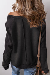 Sweat-shirt noir à manches raglan et patchwork *