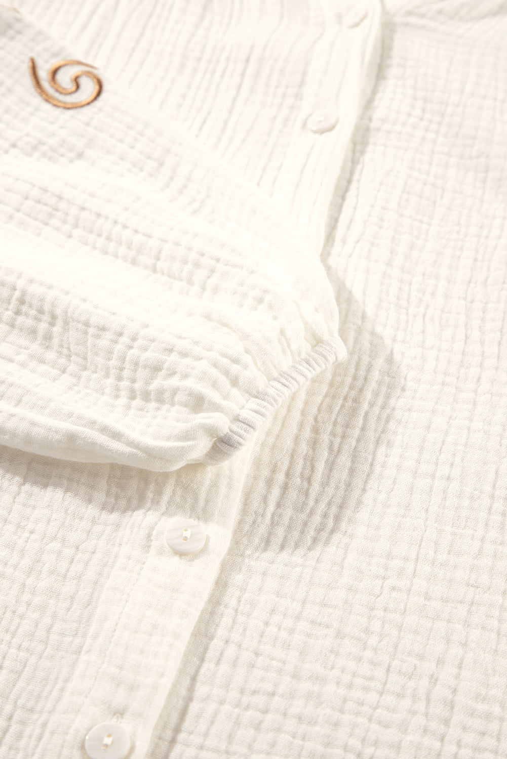 Chemise à col rond boutonnée texturée *-A WOMAN WE LOVE