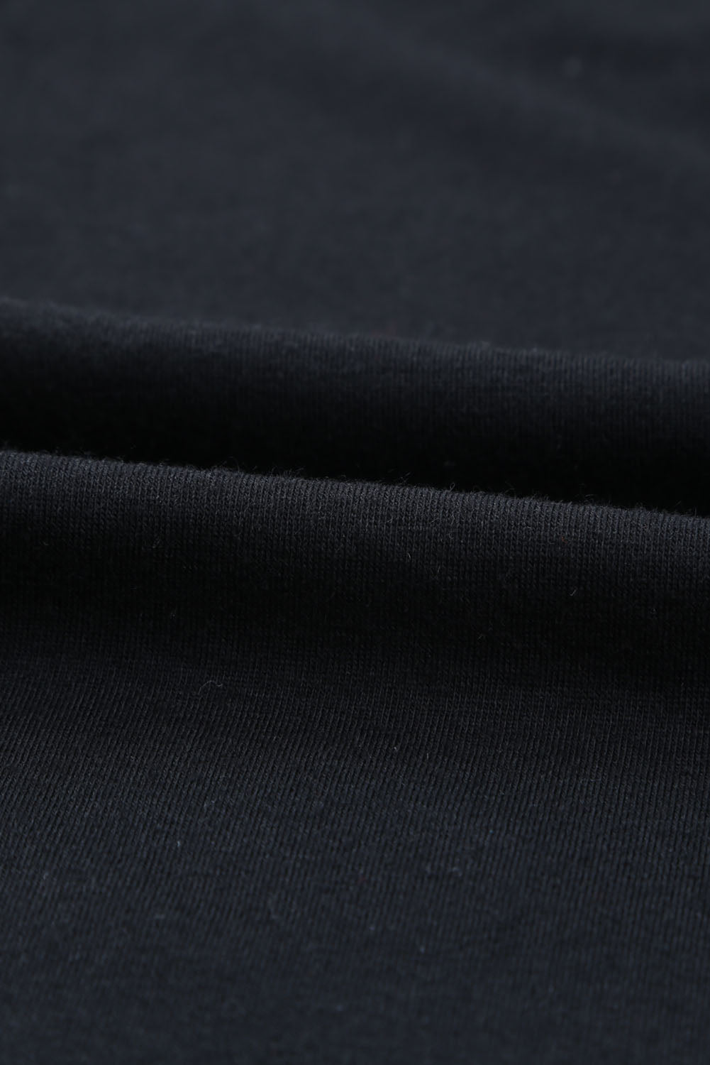 Combinaison noire à bretelles spaghetti et taille avec cordon de serrage-A WOMAN WE LOVE