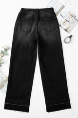 Jean ample noir à ourlet brut et poignets uniques, droit, taille haute