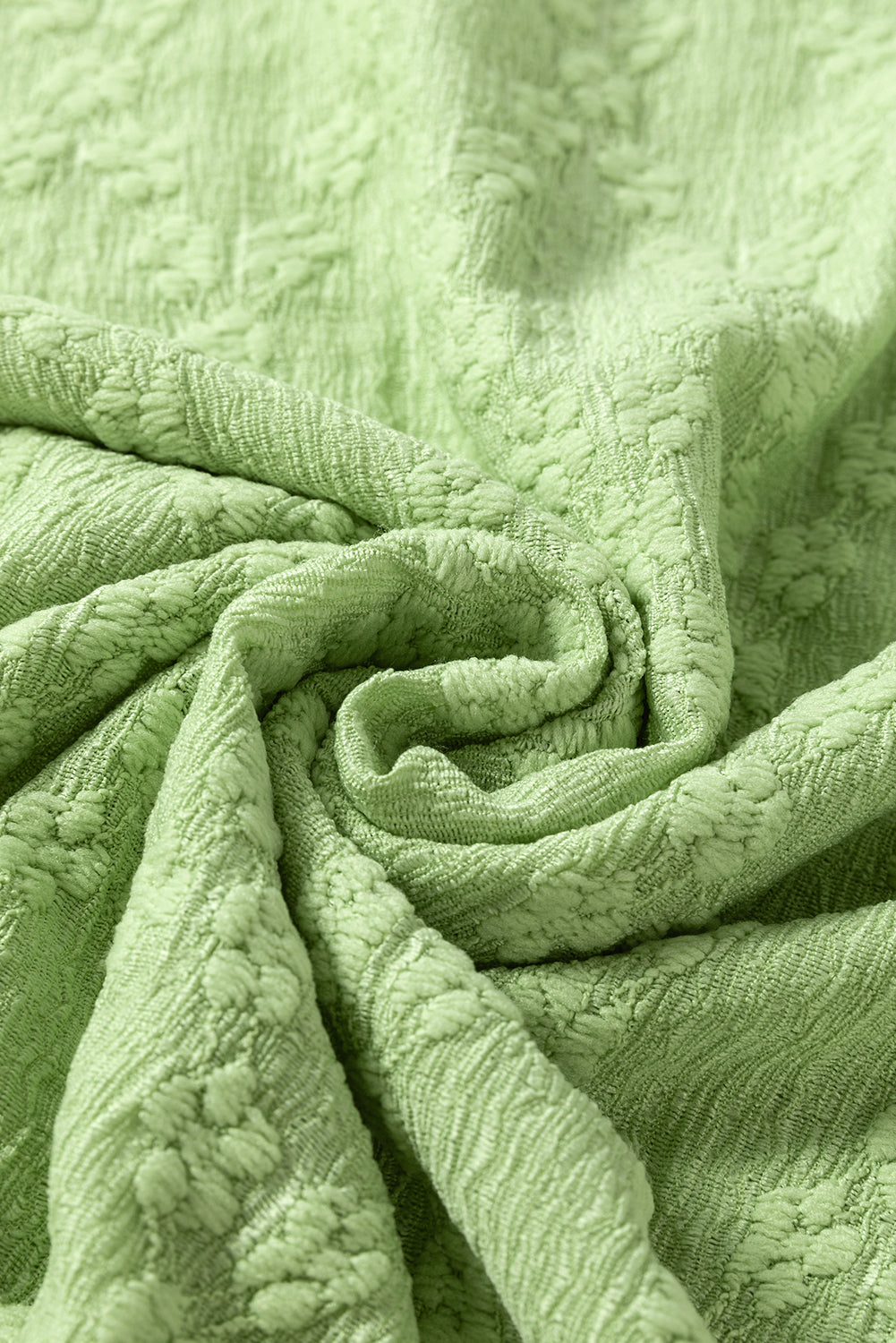 Chemisier vert clair à col ras du cou texturé et fendu sur le côté, couleur unie-A WOMAN WE LOVE