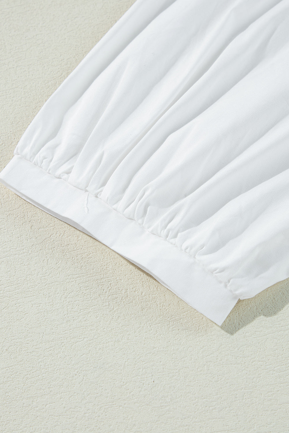 Chemisier blanc avec nœud papillon et découpe au dos, coupe ample, manches 3/4-A WOMAN WE LOVE