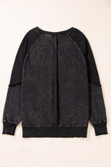Sweat-shirt noir à manches raglan et patchwork *